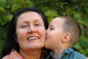 grandson kissing his granny