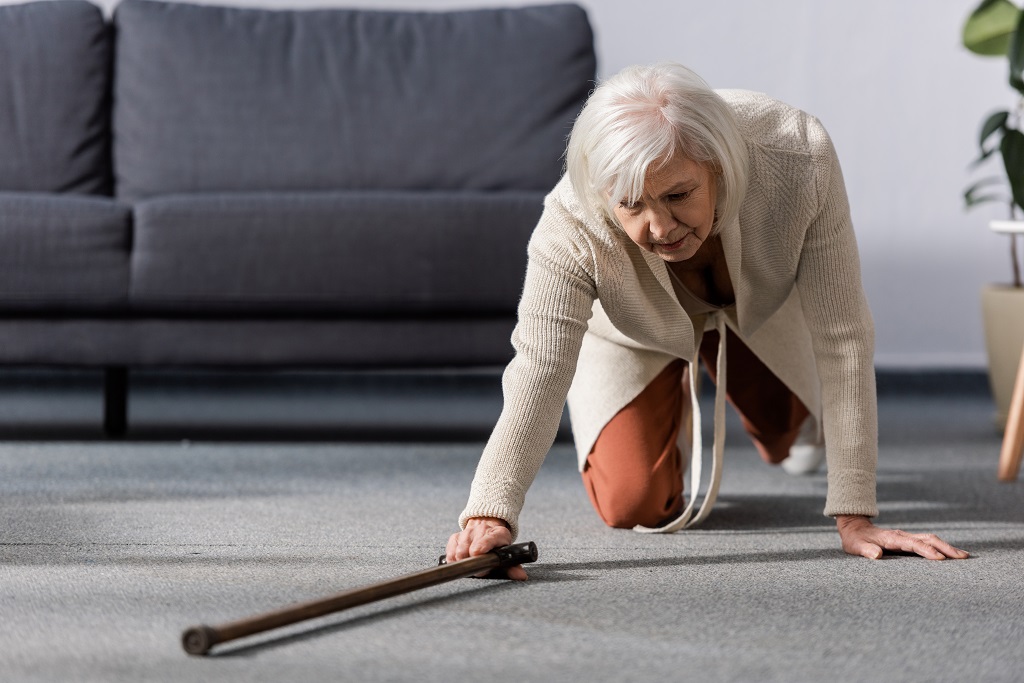 helpless senior woman falling